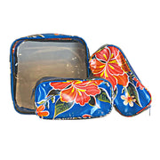 Front view:  One large and two small travel cases, multi-colored floral print on blue background.