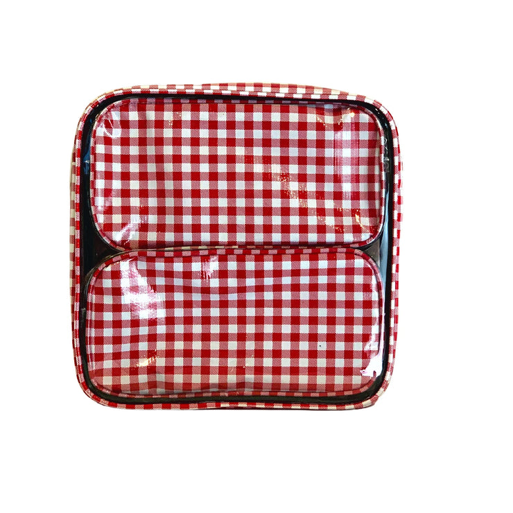 Front view: Two small travel cases, white and red checkered pattern, fitting inside the large case.