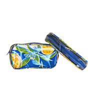 Front view: Two small travel cases, multi-colored orange fruit and blossom print on blue background.
