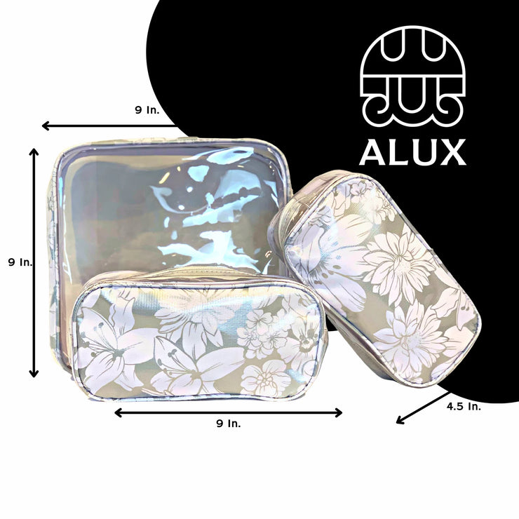 Front view:  One large case and two small travel cases, white floral print on silver background, with dimensions.