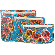 Front view: Small, medium and large slim travel bags, white zippers and multi-colored floral print on blue background.