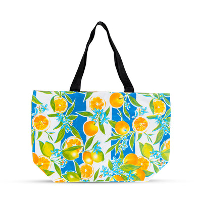 Front view: Orange fruit print on blue and white vertical striped background tote with black handles. 