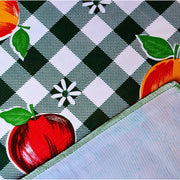 Close up: Fruit print on green and white checkered background with white underside folded up to show contrast.