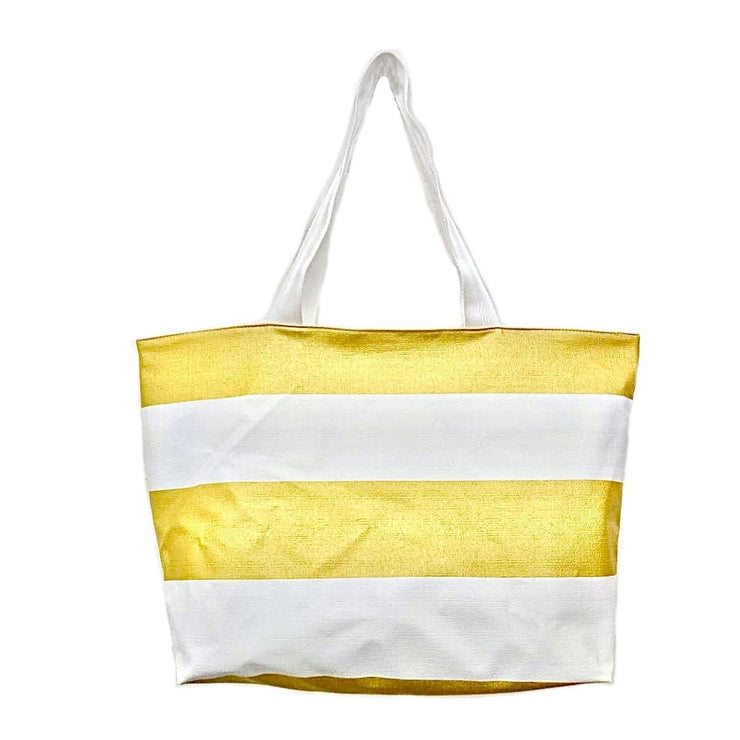 Front view: White and gold horizonal striped pattern tote with white handles. 