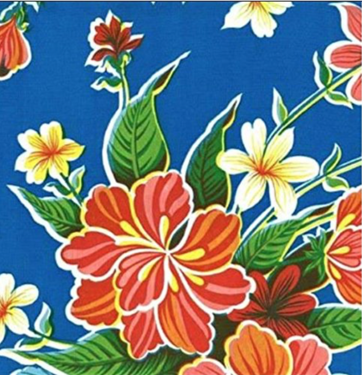 Close up: Multi-colored floral print on blue background tablecloth.
