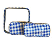 Front view: One large case and two small travel cases, white and blue checkered pattern.