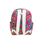 Back view: Otomi backpack with multi-colored flower/animal print on pink background, white shoulder straps and white grab handle. 