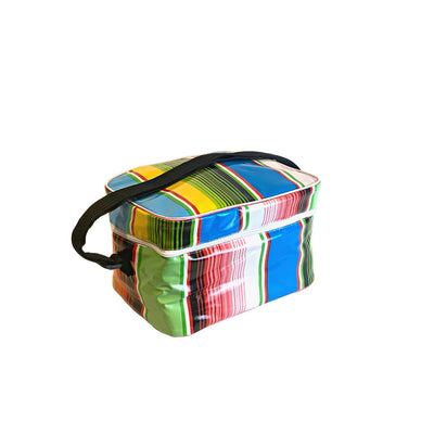 Angle view: Multi-colored vertical striped pattern lunchbox with black strap handle. 