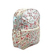 Side view: Sakura Backpack, cherry blossom print on gray background.