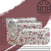 Front view: Small, medium and large slim travel bags, white zippers and cherry blossom print on a gray background, with dimensions.