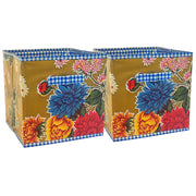 Front view: Two collapsable storage bins, multi-colored flower print on mustard background.