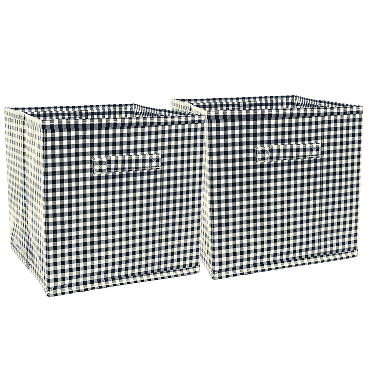 Front view: Two collapsable storage bins, white and black checkered pattern.