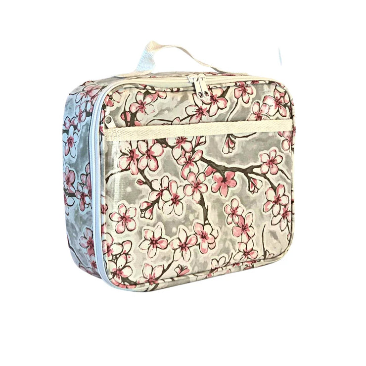 Angle view: Cherry blossom print on gray background lunchbox. 