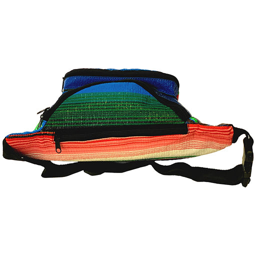 View from above: Serape fannypack with multi-colored striped pattern.